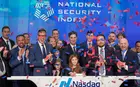 A group of adults and children celebrating the opening of the National Security Index
